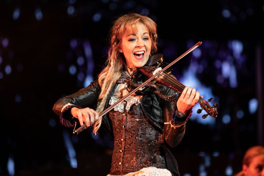 Clarkston, MI / USA - July 9, 2018: Lindsey Stirling, on tour with Evanescence, performs at DTE Energy Music Theatre.