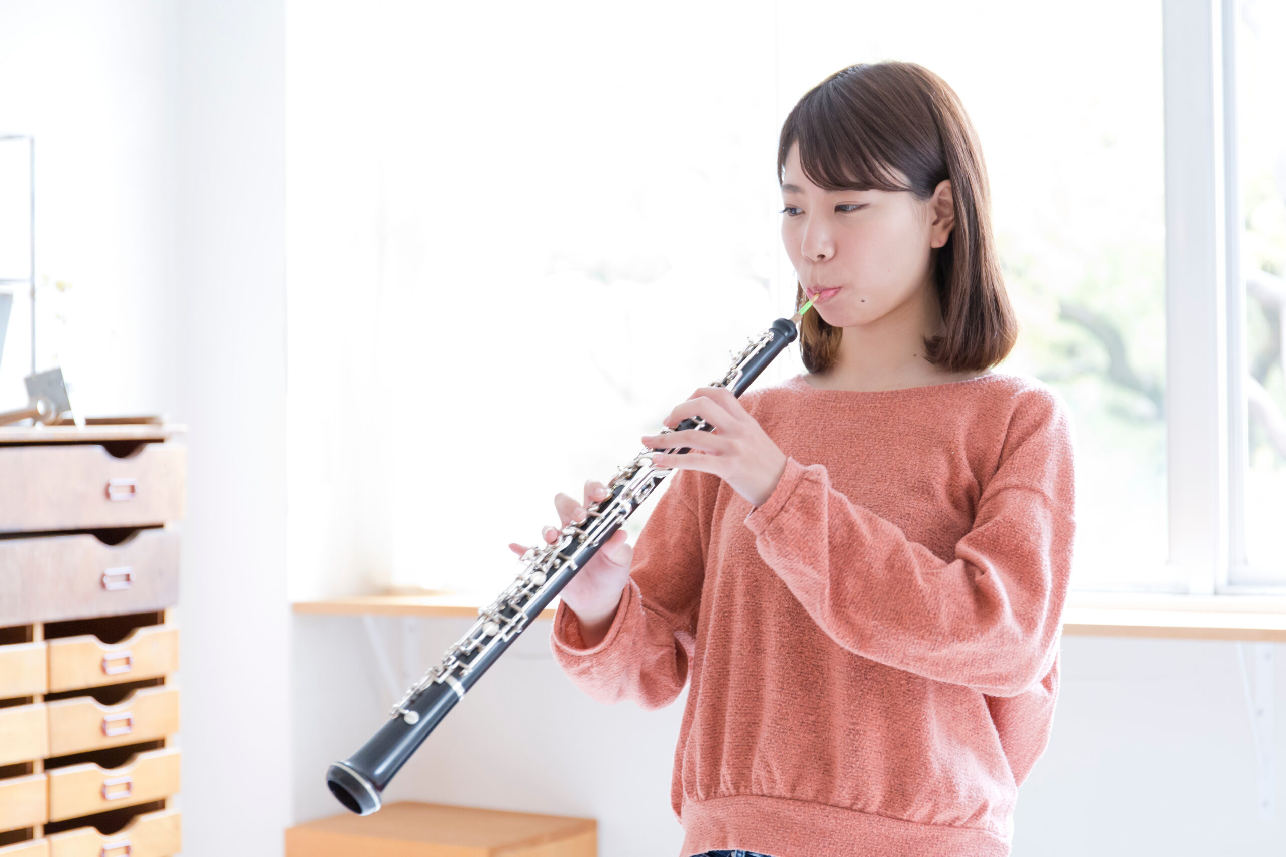 Woman playing the oboe